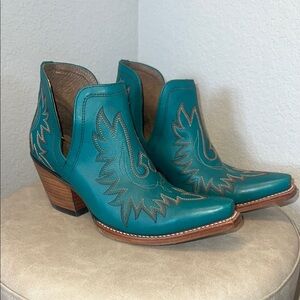 Turquoise Ariat western ankle boot.